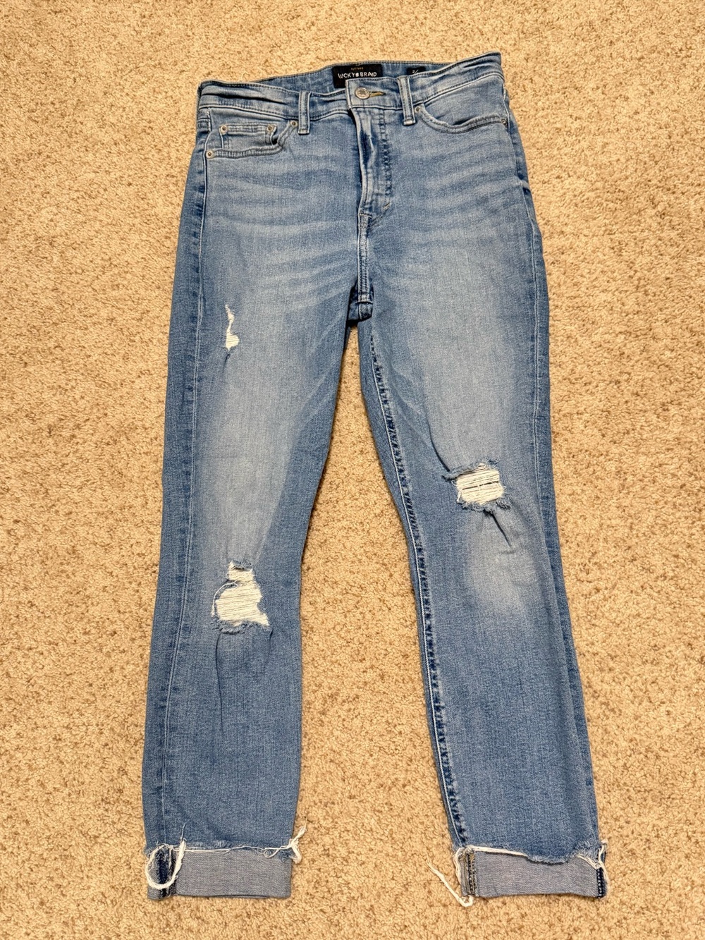Women’s Light Blue Distressed Jeans